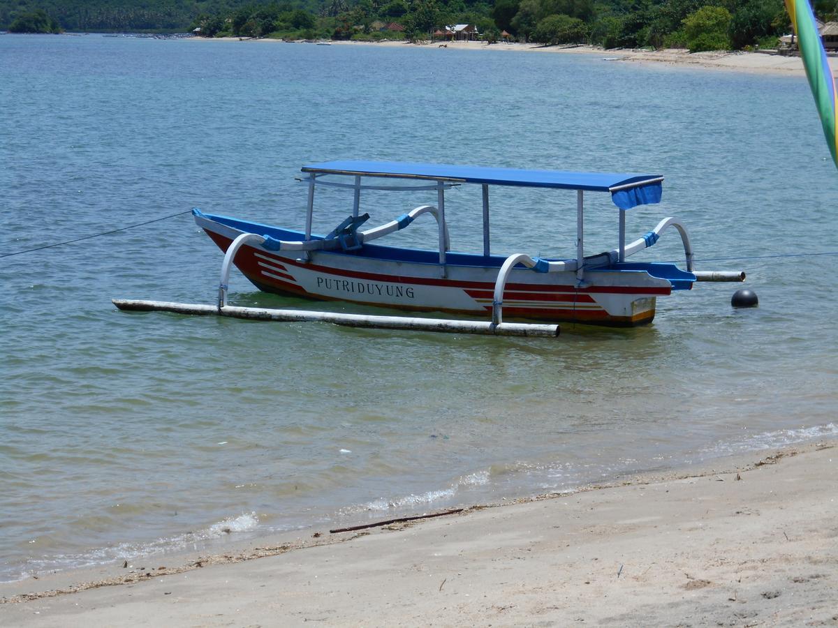Silver Fern Beach Retreat Sekotong Bagian luar foto